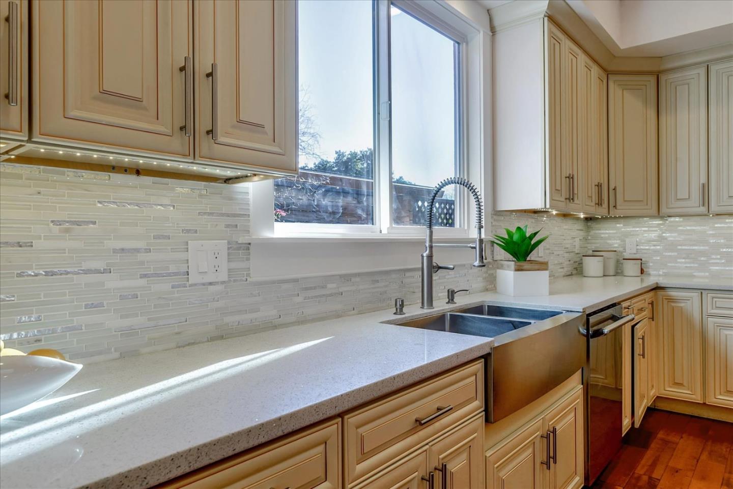 10380 Sterling Boulevard Cupertino, CA 95014 - Photo 16 of 49 a kitchen with a sink and a window