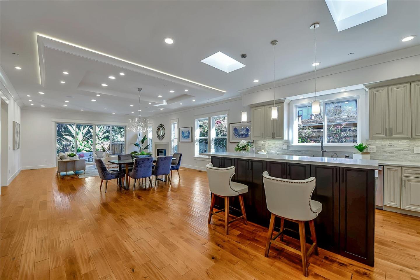 10380 Sterling Boulevard Cupertino, CA 95014 - Photo 17 of 49 a kitchen with lots of counter space and a dining table view