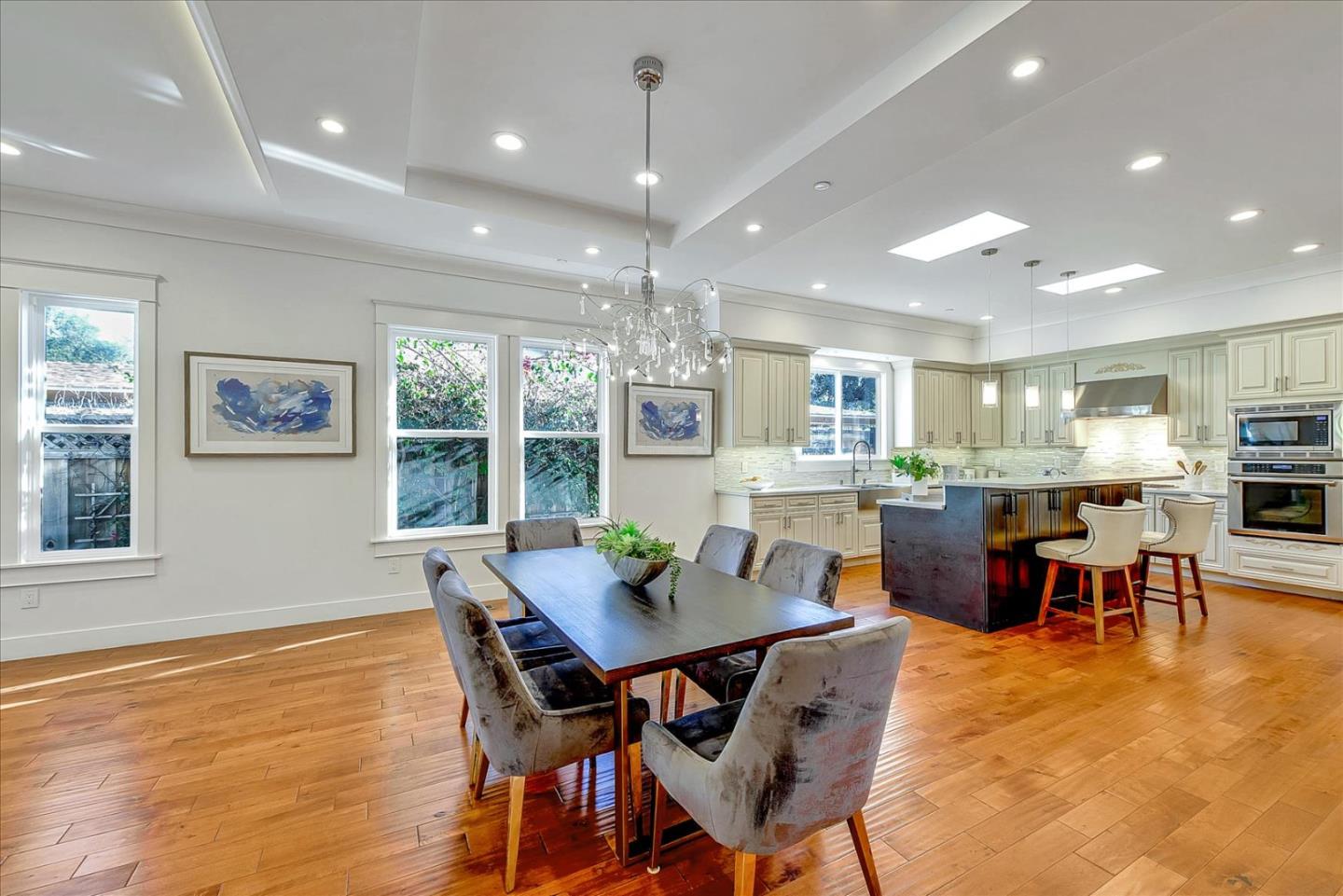 10380 Sterling Boulevard Cupertino, CA 95014 - Photo 20 of 49 a view of a dining room with furniture window and wooden floor