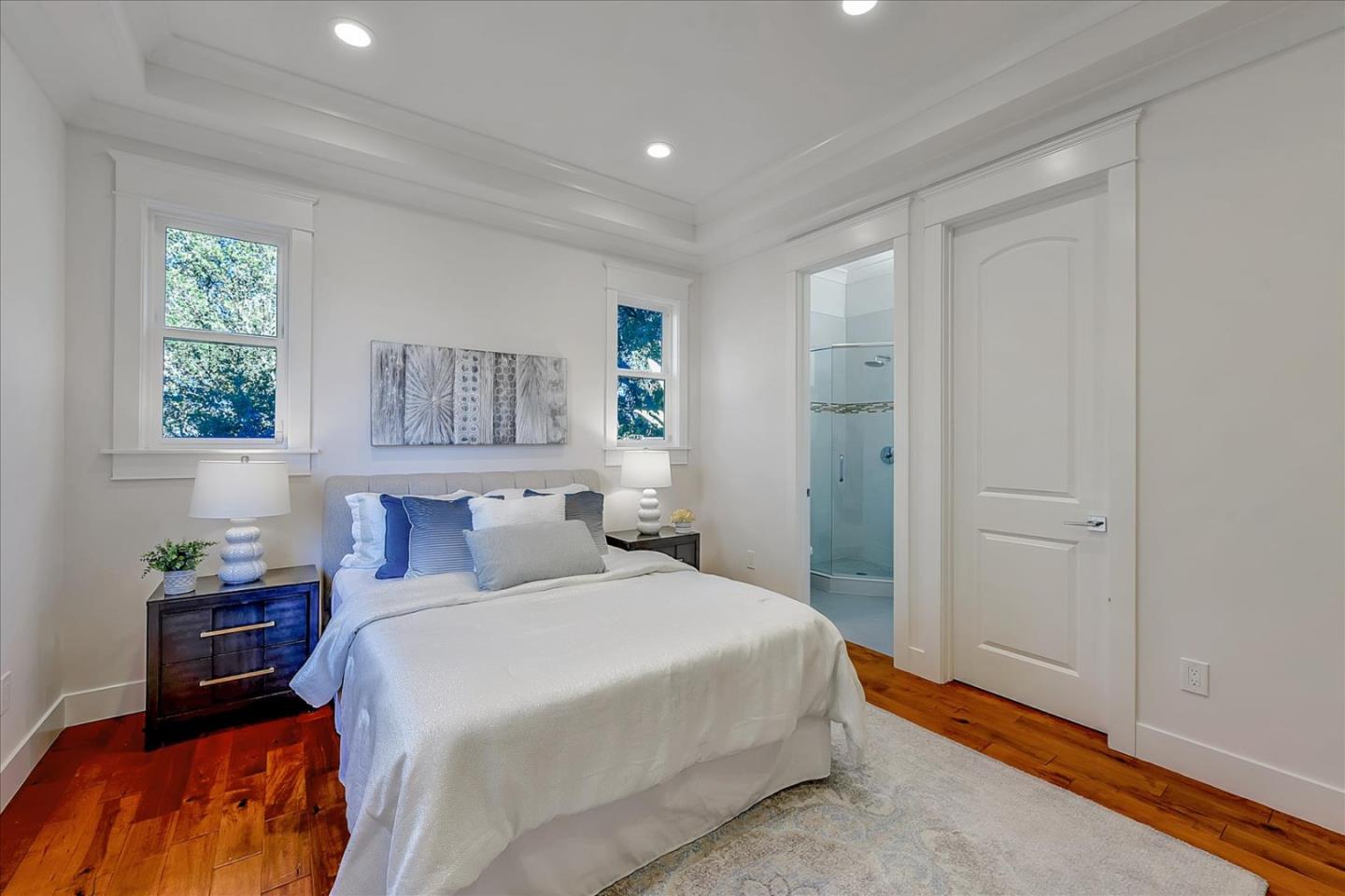 10380 Sterling Boulevard Cupertino, CA 95014 - Photo 22 of 49 a bedroom with a large bed and a window