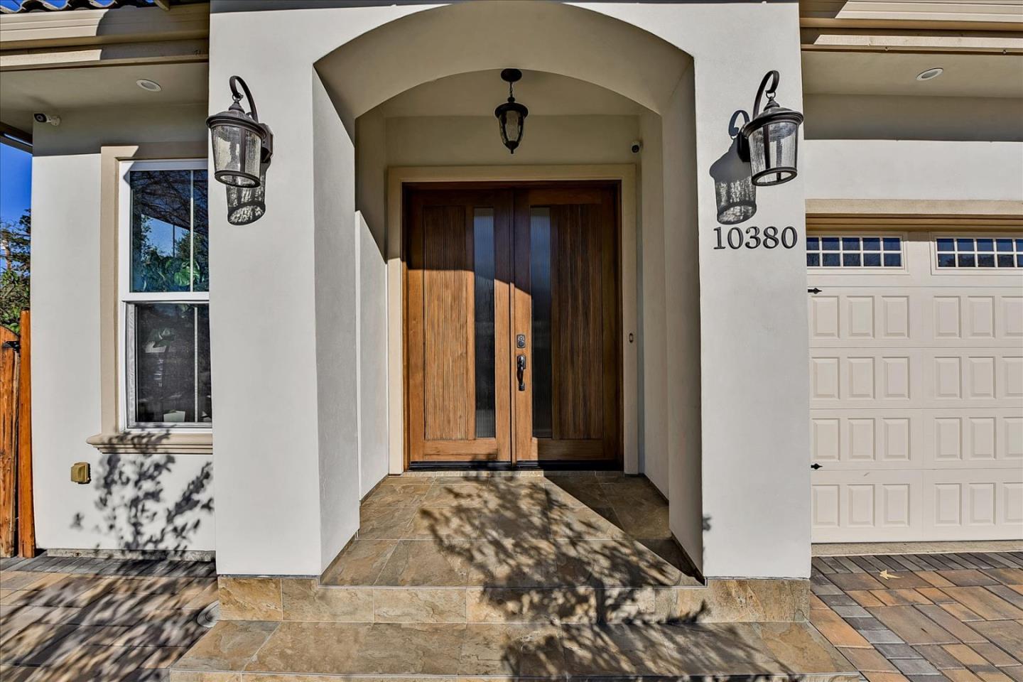 10380 Sterling Boulevard Cupertino, CA 95014 - Photo 3 of 49 a bedroom with a bed and a window
