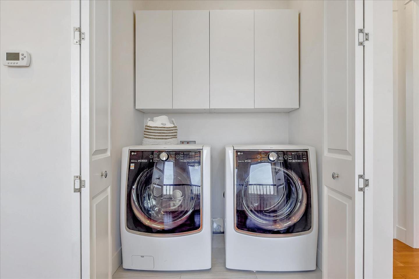 10380 Sterling Boulevard Cupertino, CA 95014 - Photo 41 of 49 a close view of a utility room with washer and dryer