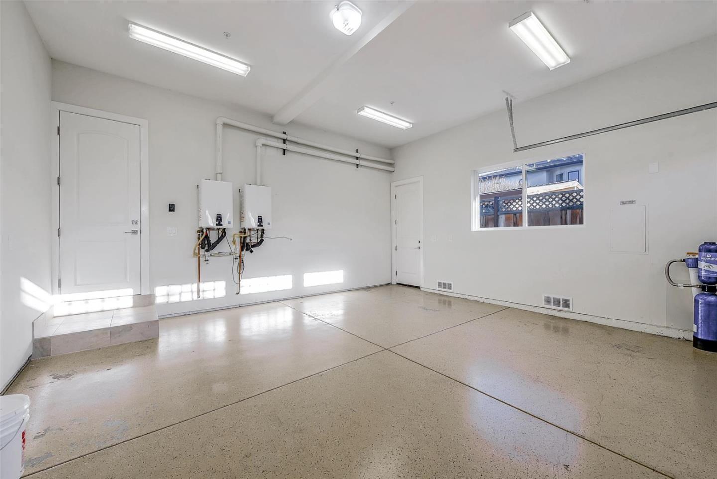 10380 Sterling Boulevard Cupertino, CA 95014 - Photo 42 of 49 a view of an empty room with a window