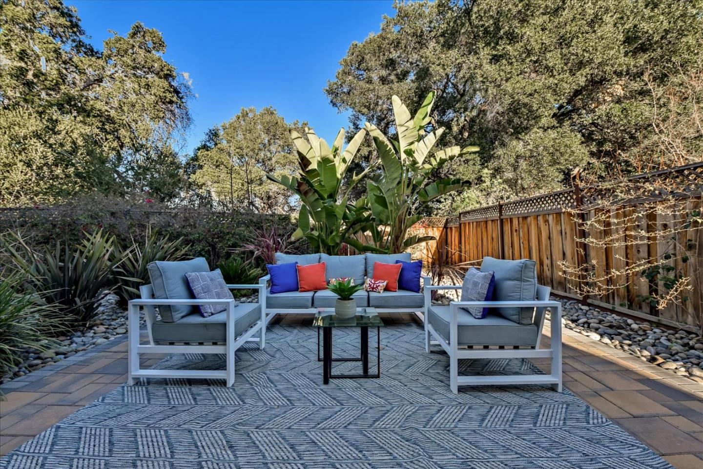 10380 Sterling Boulevard Cupertino, CA 95014 - Photo 46 of 49 a outdoor living space with furniture and wooden floor