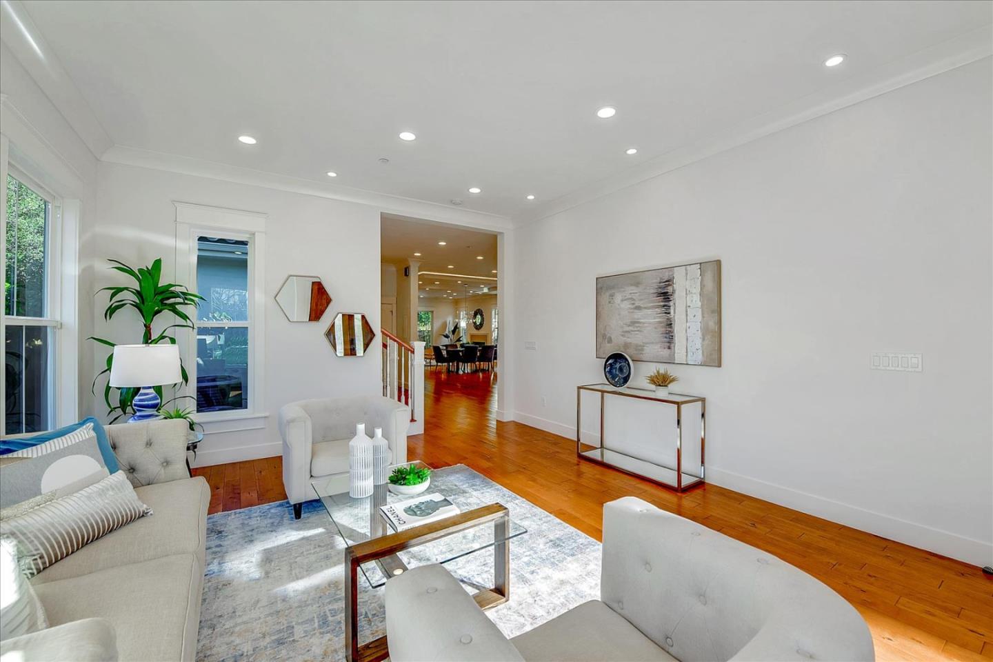10380 Sterling Boulevard Cupertino, CA 95014 - Photo 7 of 49 a living room with furniture and a wooden floor