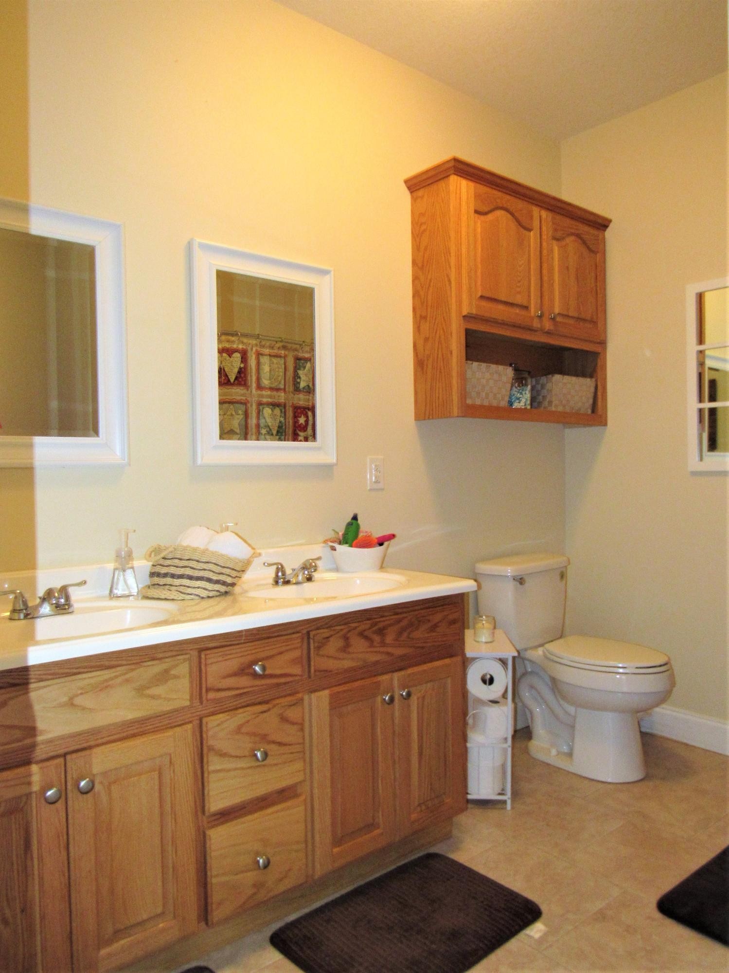 155 Fritts Road Lancing, TN 37770 - Photo 13 of 30 a bathroom with a toilet sink and mirror