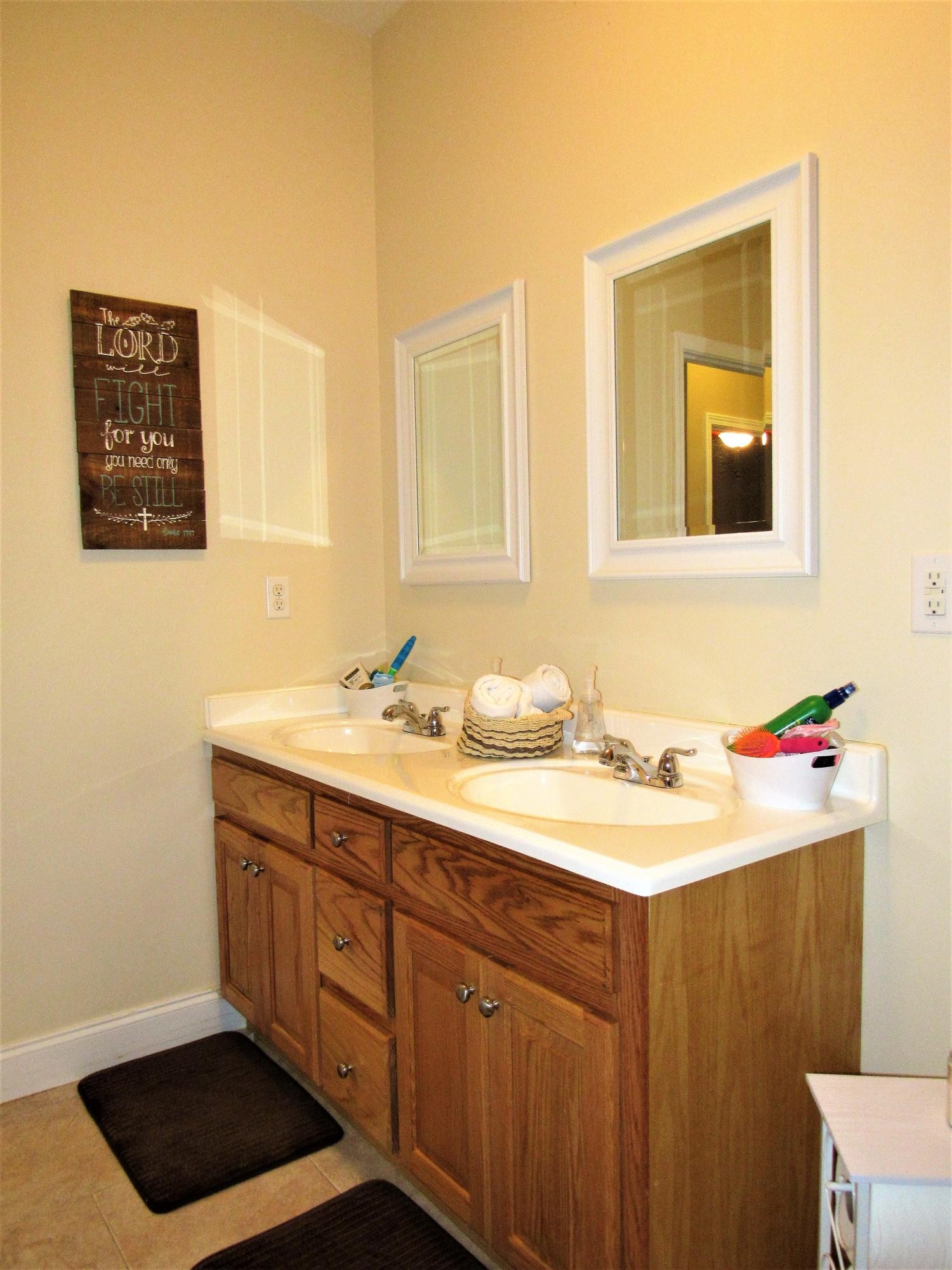 155 Fritts Road Lancing, TN 37770 - Photo 15 of 30 a bathroom with a sink and a mirror