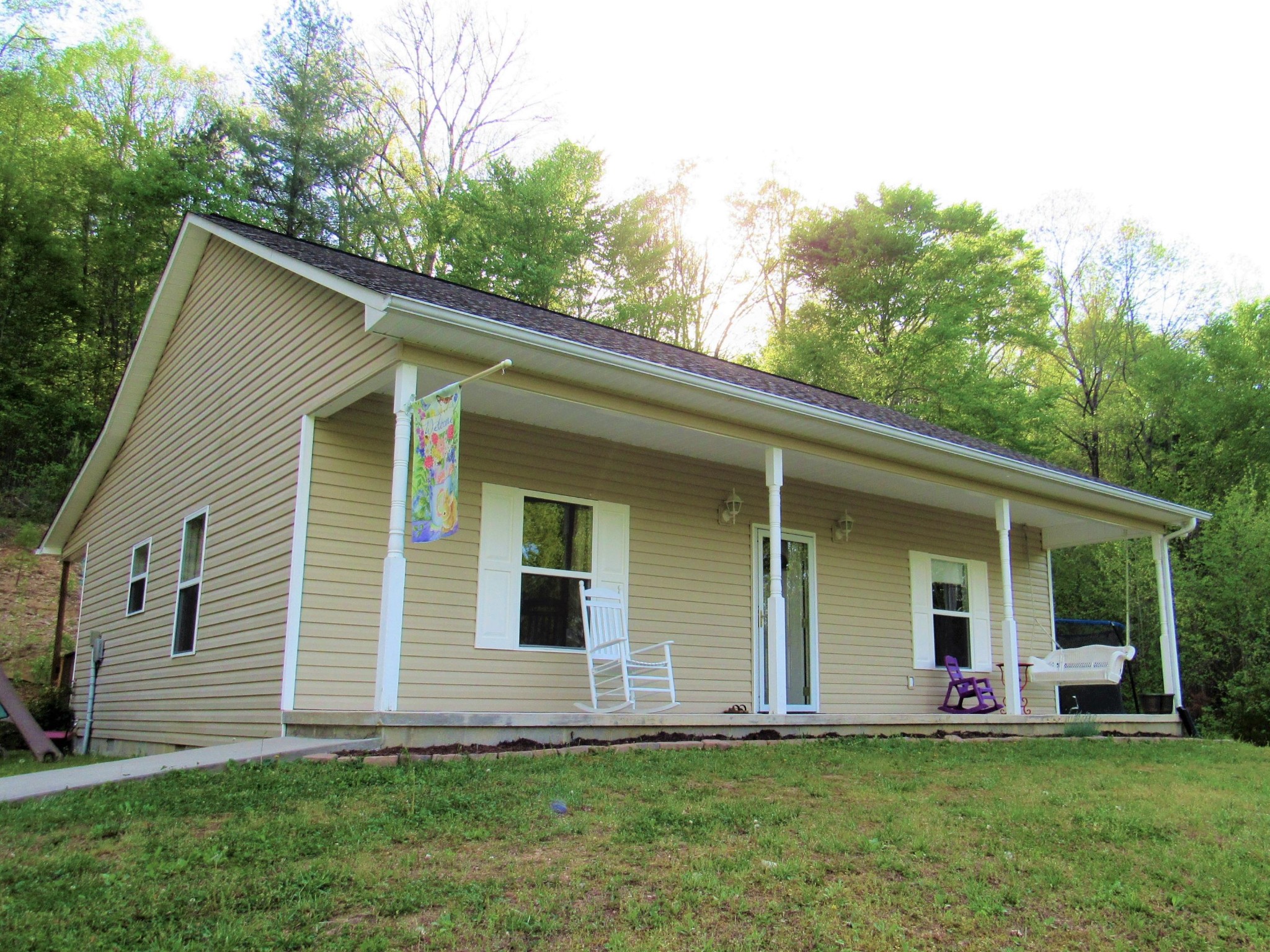 155 Fritts Road Lancing, TN 37770 - Photo 26 of 30 a front view of house with yard and green space