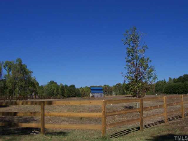 222 Robertson Road Roxboro, NC 27574 - Photo 8 of 10 a view of a yard