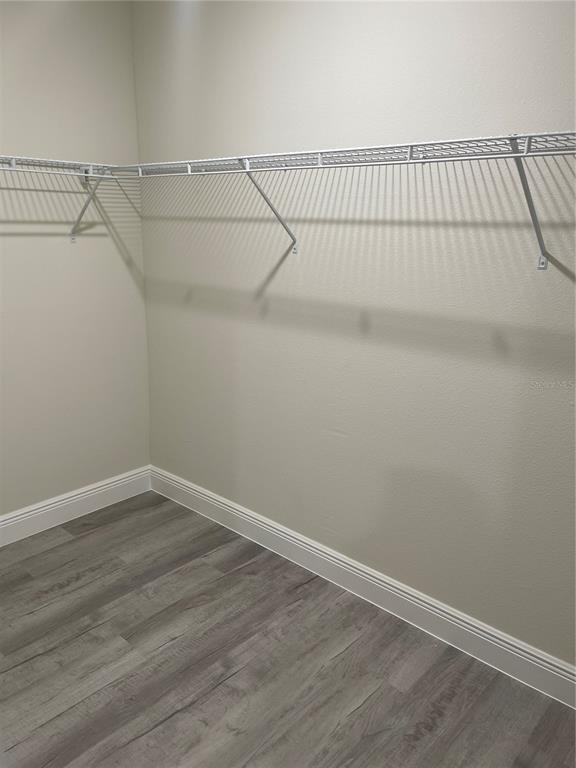 10631 North Frantz Avenue Citrus Springs, FL 34434 - Photo 12 of 21 a view of a room with racks on the wall