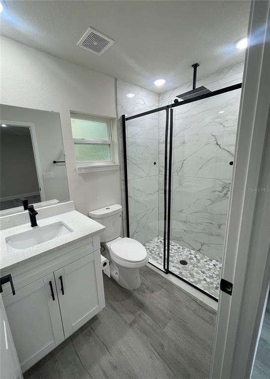 10631 North Frantz Avenue Citrus Springs, FL 34434 - Photo 9 of 21 a bathroom with a sink toilet and shower