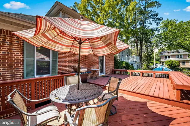 a view of a chairs and table on the wooden floor
