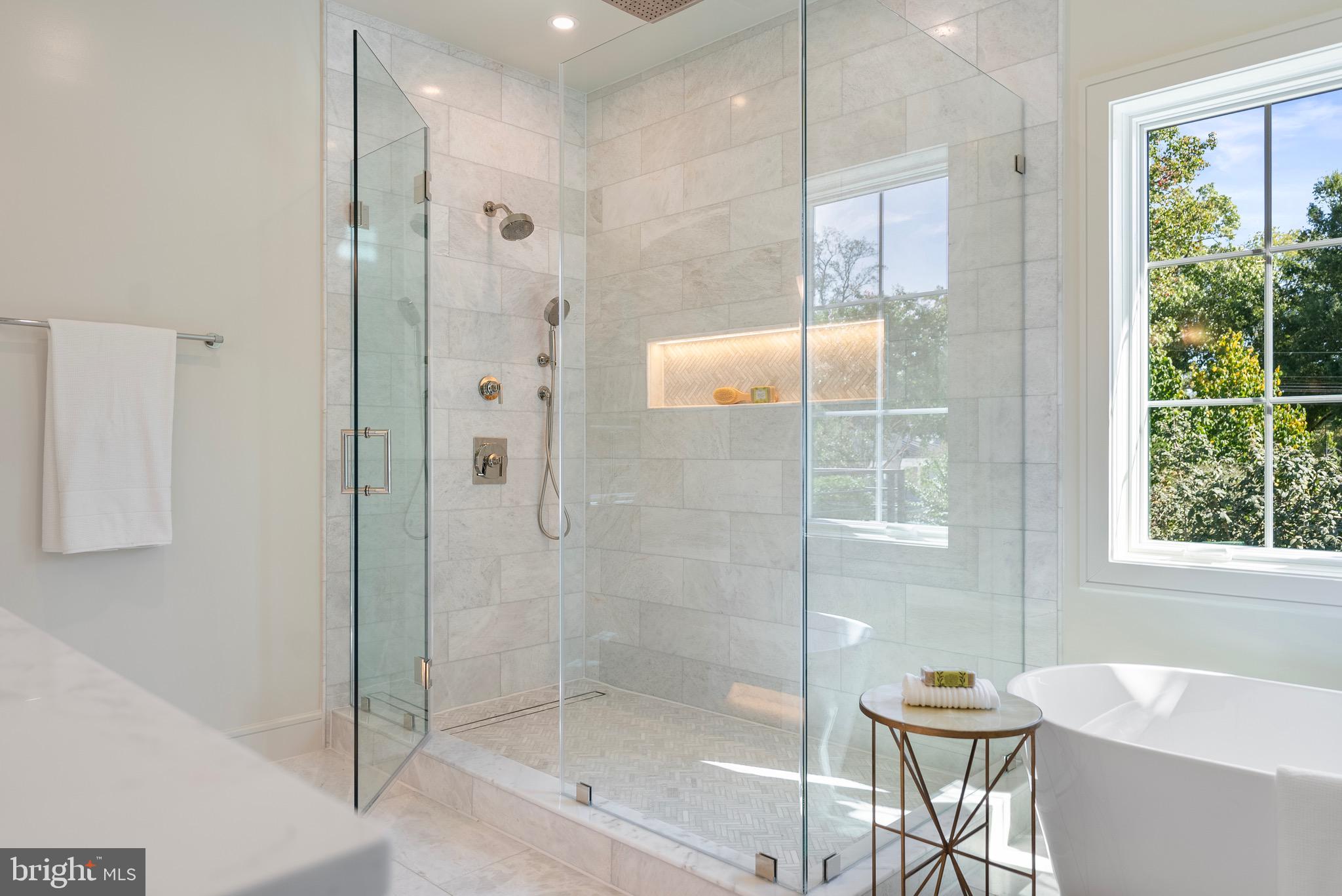 7923 Chelton Road Bethesda, MD 20814 - Photo 30 of 44 a bathroom with a shower and a bathtub
