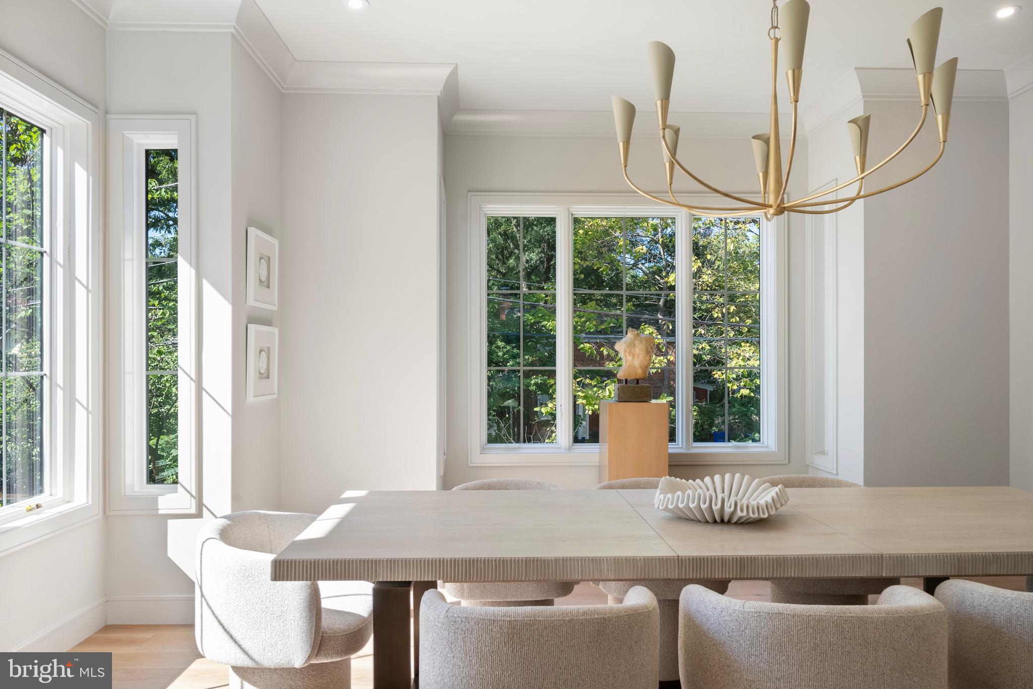 7923 Chelton Road Bethesda, MD 20814 - Photo 10 of 44 a dining room with furniture and a window