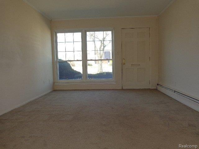 2821 West Thirteen Mile Road, Unit 2 Royal Oak, MI 48073 - Photo 21 of 23 261-843021 Living Room c.JPG