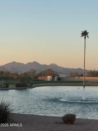 a view of a lake with a mountain in the background