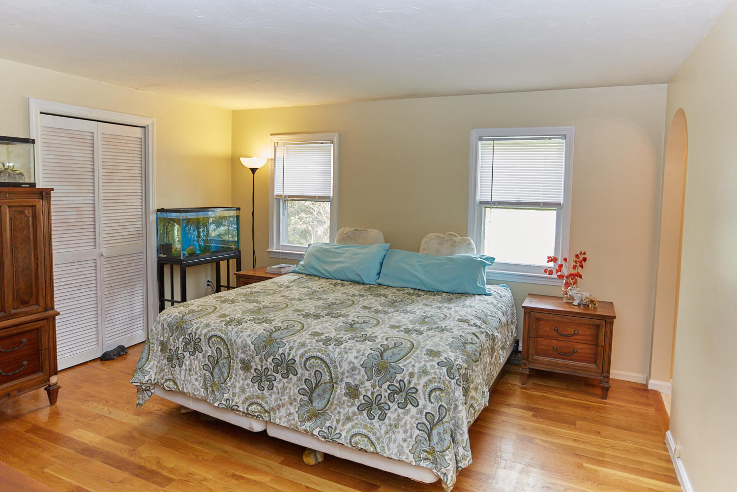 106 Foxglove Road Centerville, MA 02632 - Photo 17 of 23 a bedroom with a bed and a dresser in it