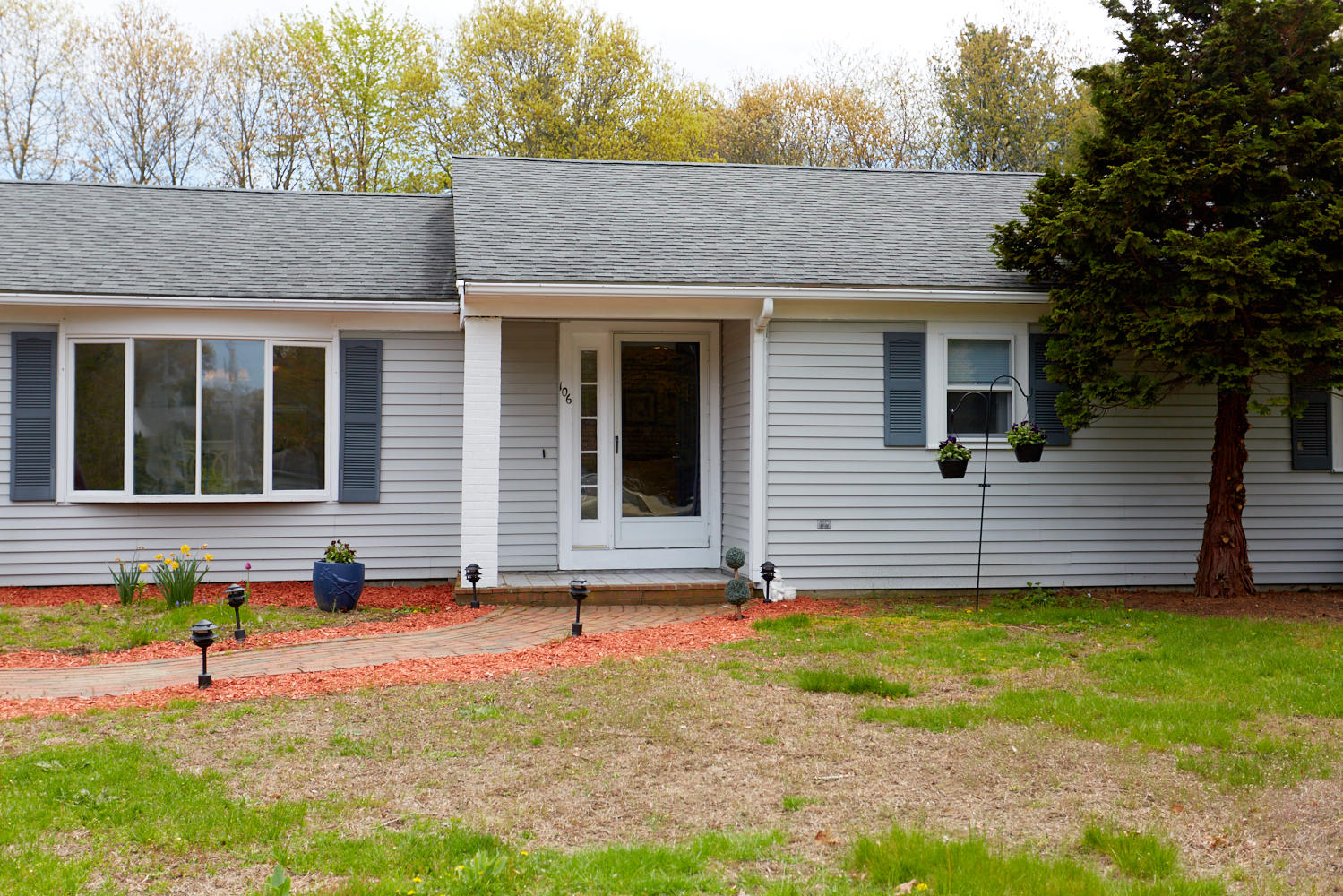 106 Foxglove Road Centerville, MA 02632 - Photo 3 of 23 a view of house with backyard and garden