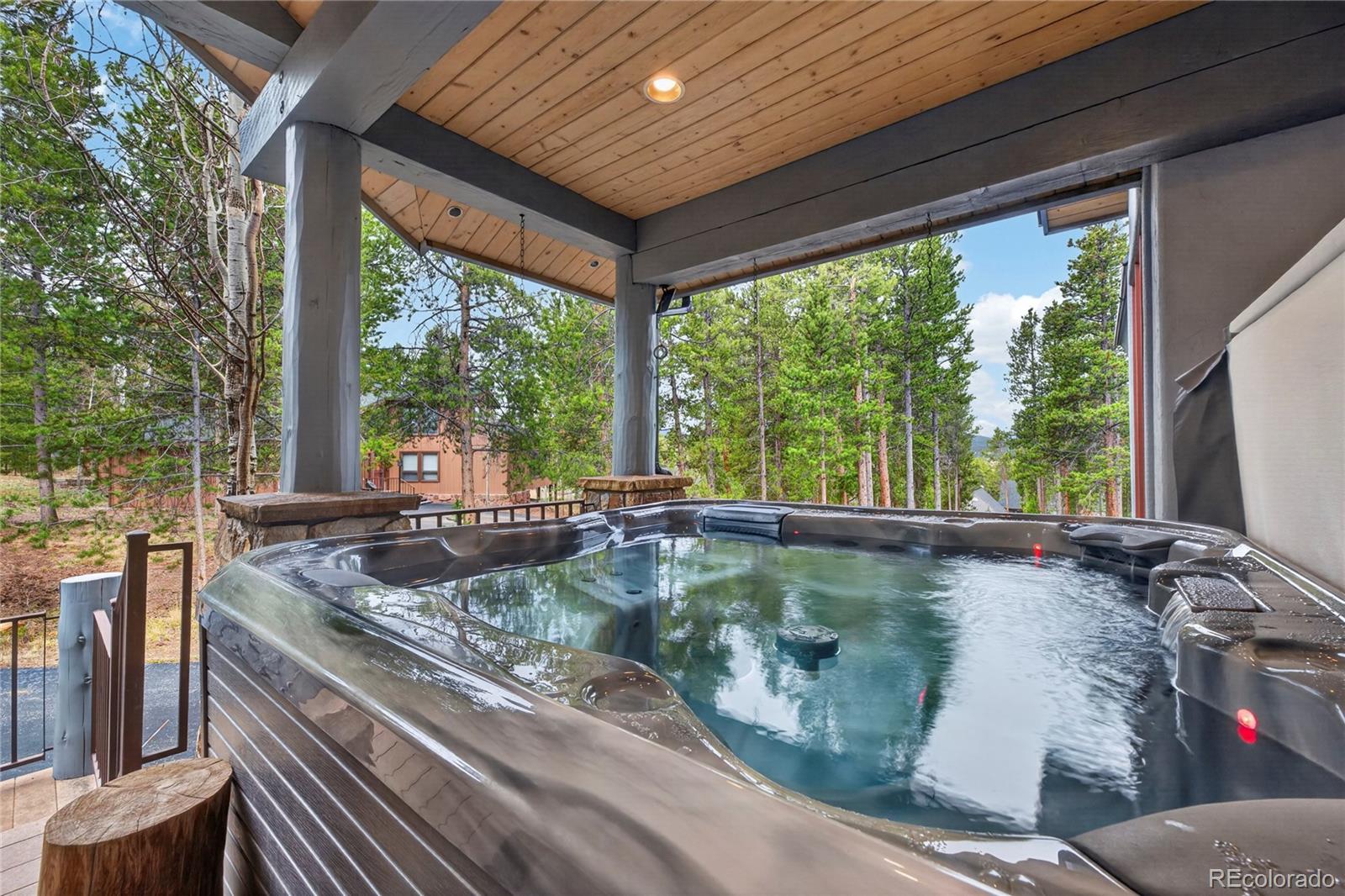 148 County Road Tabernash, CO 80478 - Photo 38 of 45 a view of a swimming pool with a outdoor seating
