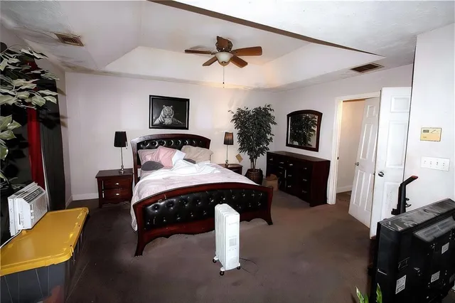 a bathroom with a sink double vanity granite and a mirror