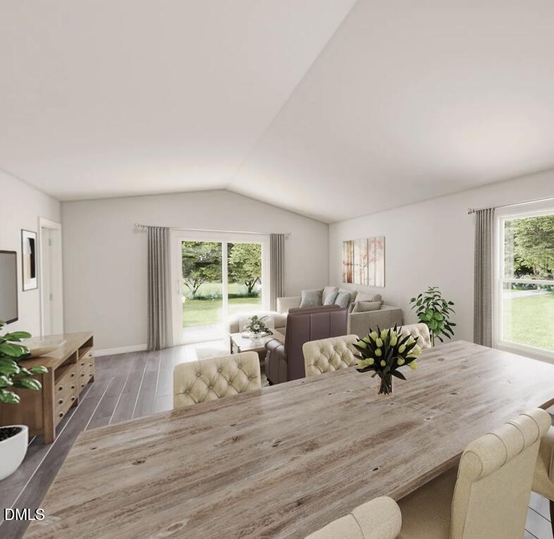 105 Lillian Court Roxboro, NC 27573 - Photo 2 of 7 a living room with furniture and a large window