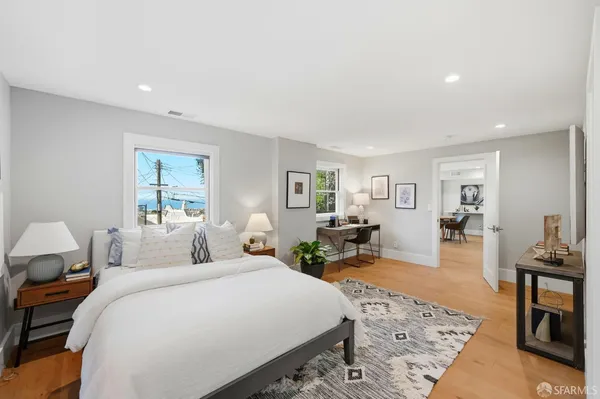 a front view of a building with sitting space