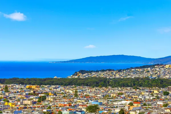 a childrens park with lots of swings and slides
