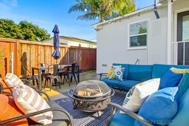 a view of a swimming pool with a patio