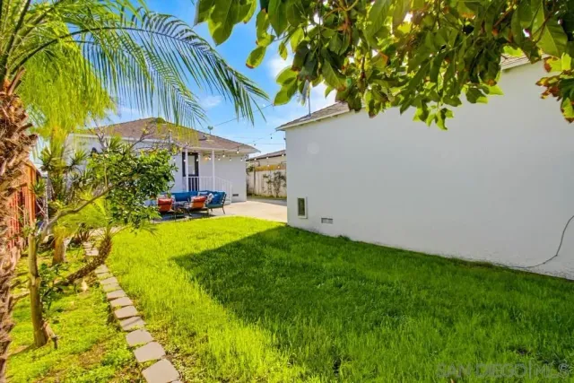 a view of a park that has a sign board