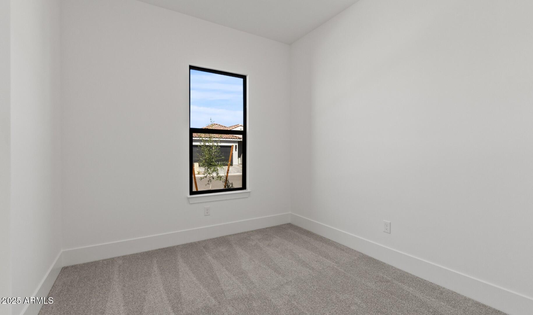 20307 West Roma Avenue Buckeye, AZ 85396 - Photo 15 of 48 a view of an empty room and window