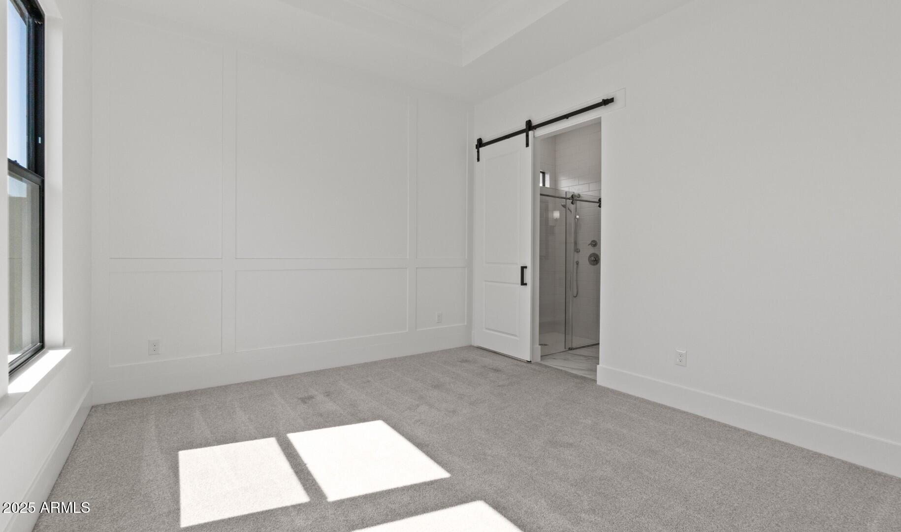 20307 West Roma Avenue Buckeye, AZ 85396 - Photo 19 of 48 an empty room with a window