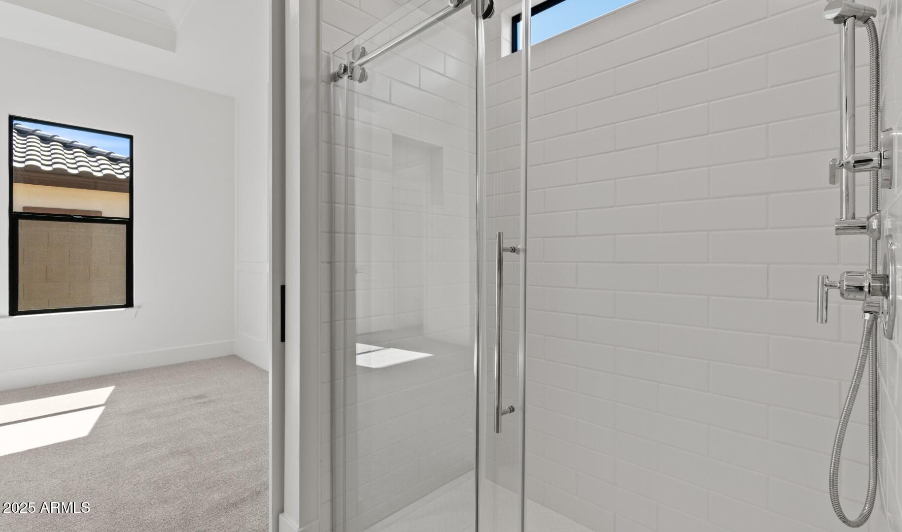 20307 West Roma Avenue Buckeye, AZ 85396 - Photo 21 of 48 a bathroom with a shower