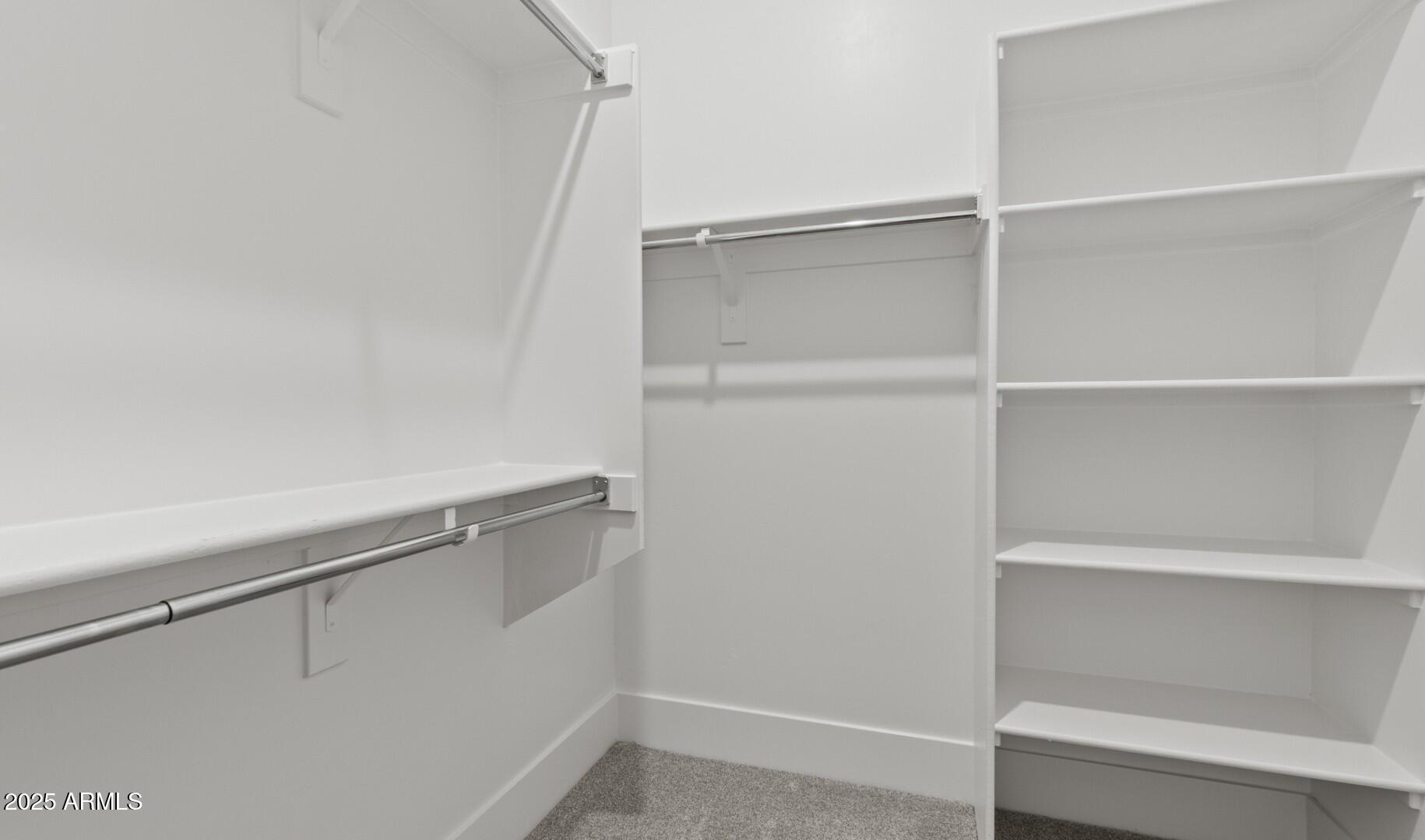 20307 West Roma Avenue Buckeye, AZ 85396 - Photo 22 of 48 a view of an empty walk in closet