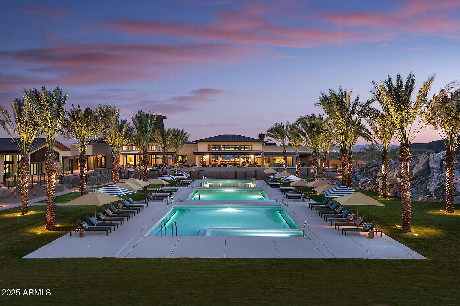 20307 West Roma Avenue Buckeye, AZ 85396 - Photo 40 of 48 a view of a swimming pool patio and outdoor seating