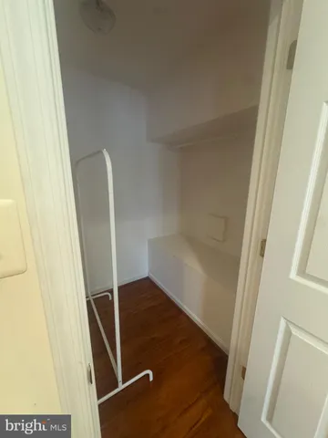 a view of an empty walk in closet