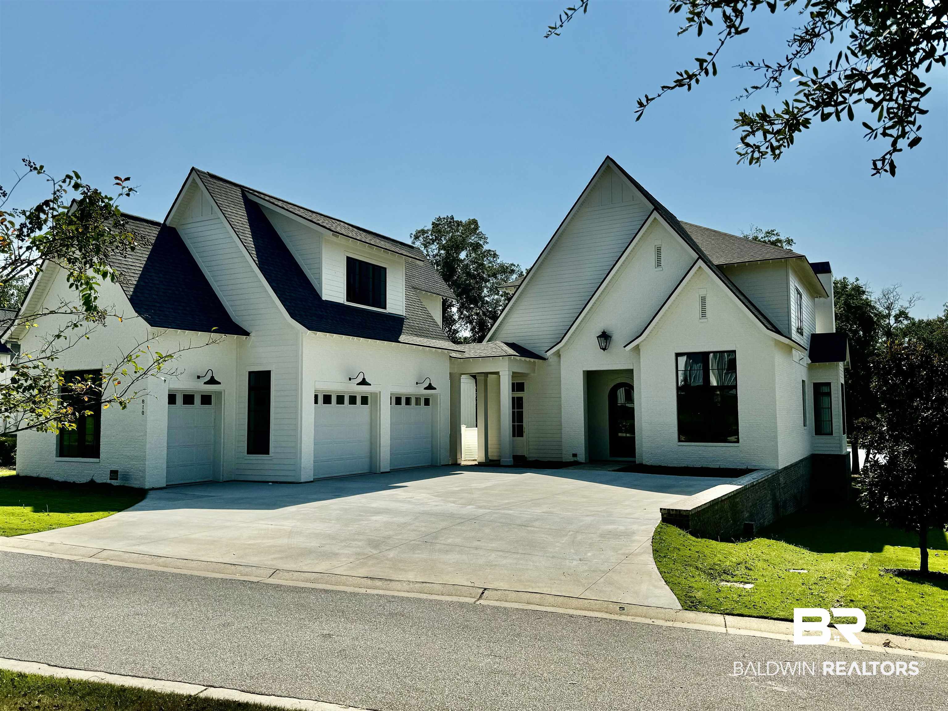 810 Apricot Lane Fairhope, AL 36532 - Photo 1 of 2 View of front of property with a garage and a front lawn