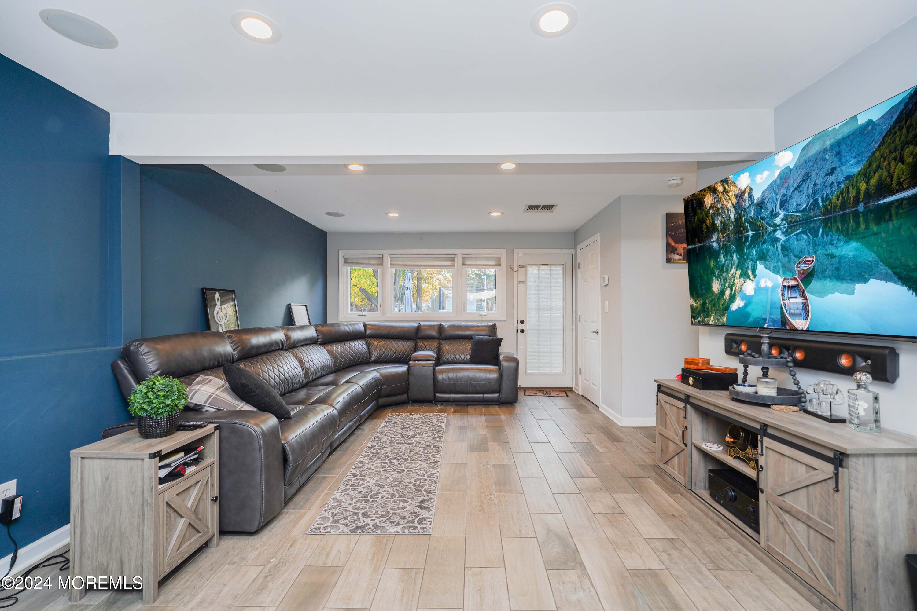 13 Bartle Road Somerset, NJ 08873 - Photo 12 of 26 a living room with furniture and a wooden floor