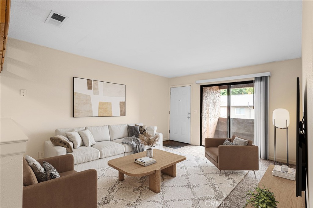 1114 Nord Avenue, Unit 8 Chico, CA 95926 - Photo 1 of 40 a living room with furniture and a window