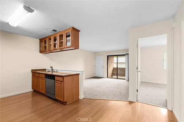 a hallway with cabinets
