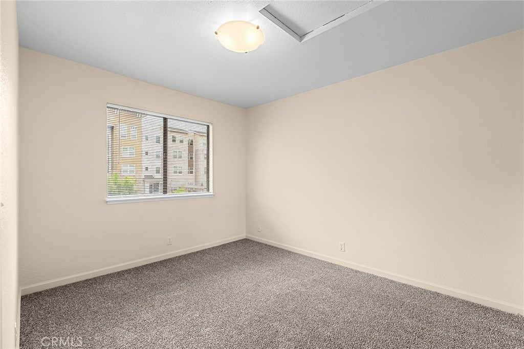 1114 Nord Avenue, Unit 8 Chico, CA 95926 - Photo 20 of 40 an empty room with windows