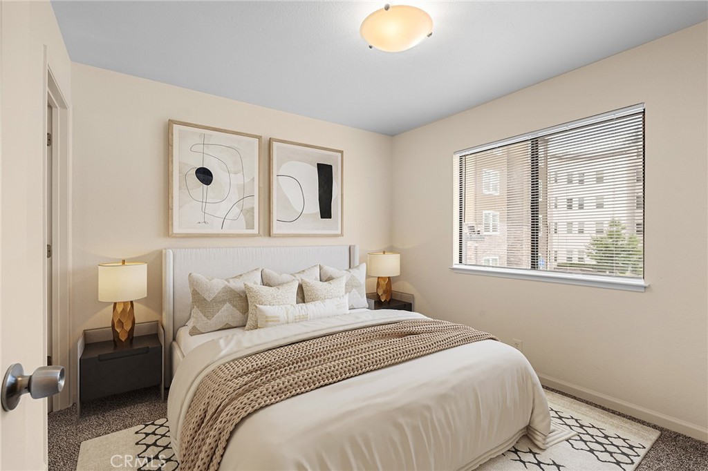 1114 Nord Avenue, Unit 8 Chico, CA 95926 - Photo 24 of 40 a bedroom with a bed and a cabinets