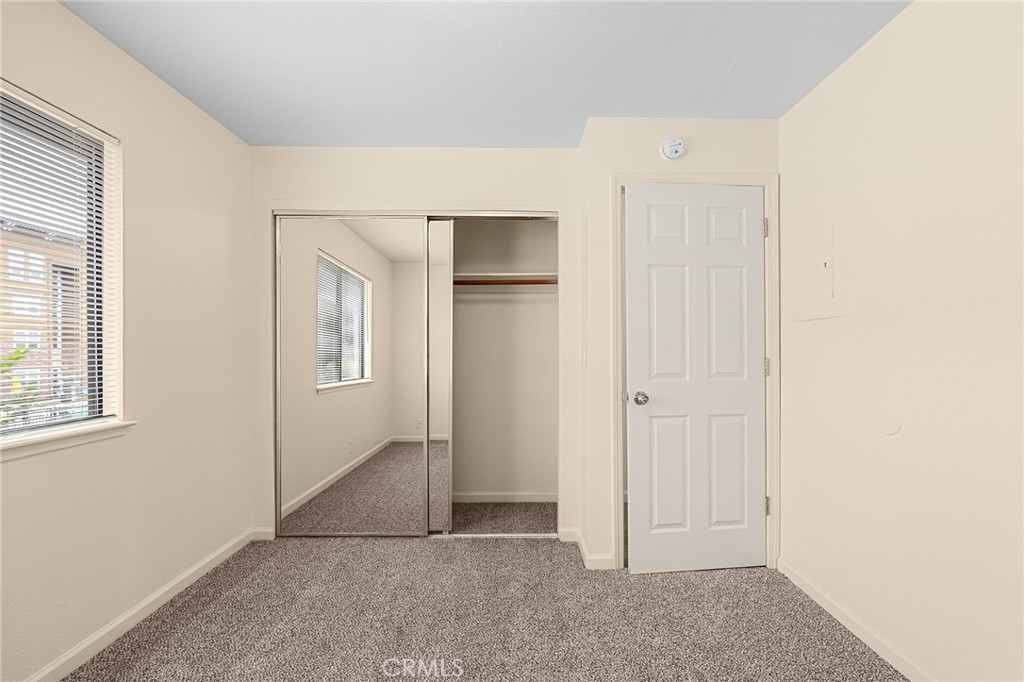 1114 Nord Avenue, Unit 8 Chico, CA 95926 - Photo 26 of 40 an empty room with windows