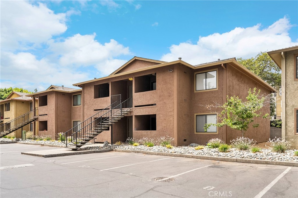 1114 Nord Avenue, Unit 8 Chico, CA 95926 - Photo 30 of 40 a front view of a house with a garden