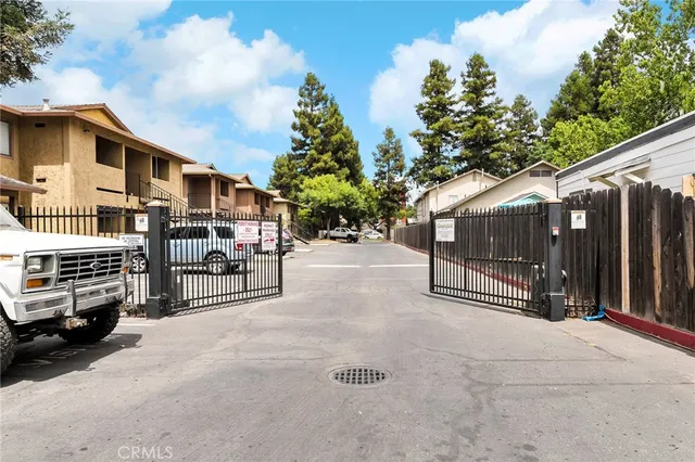 a view of a cars park in front of house