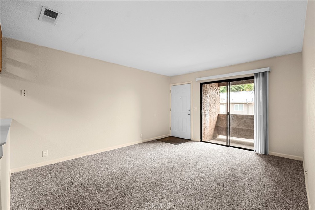 1114 Nord Avenue, Unit 8 Chico, CA 95926 - Photo 8 of 40 a view of an empty room with a window