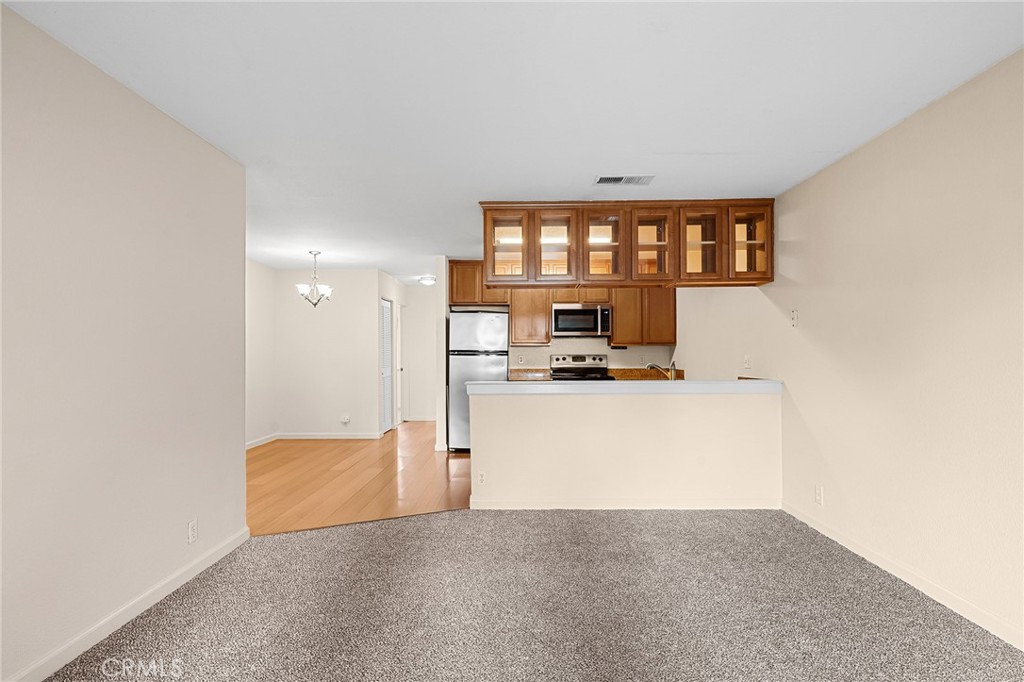 1114 Nord Avenue, Unit 8 Chico, CA 95926 - Photo 10 of 40 a view of kitchen and living room
