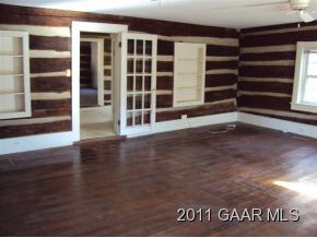 1064 High Rock Road Raphine, VA 24472 - Photo 7 of 7 an empty room with wooden floor and windows
