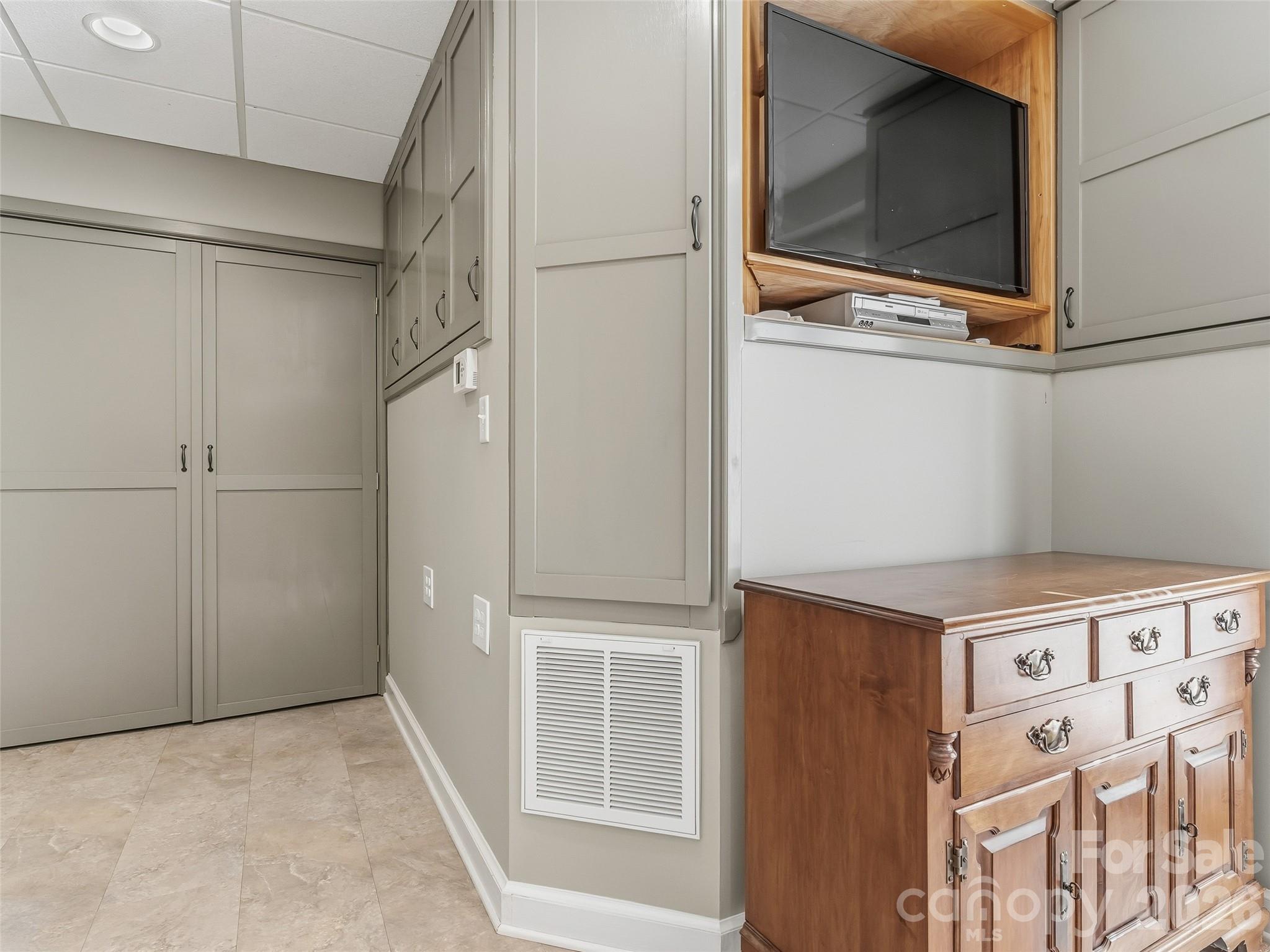 1340 Macedonia Road Saluda, NC 28773 - Photo 35 of 45 a view of walk in closet with window