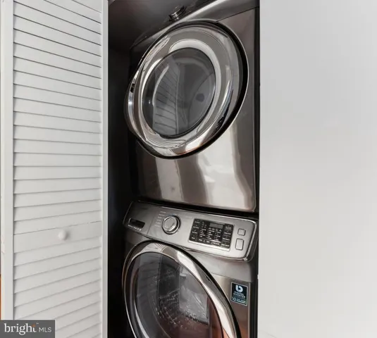 a view of washer and dryer in a utility room
