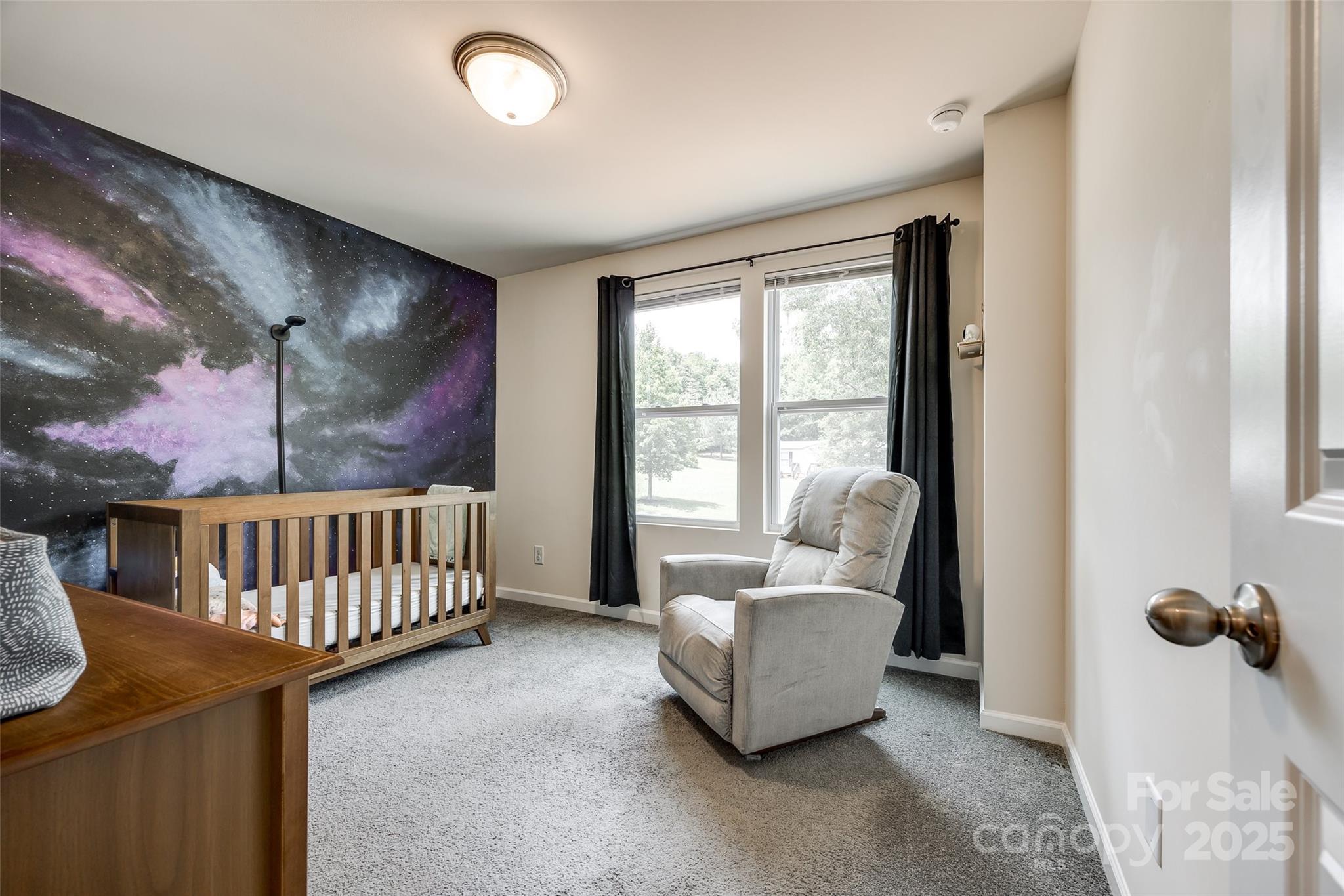 415 Kickapoo Avenue Gastonia, NC 28056 - Photo 15 of 24 a bedroom with furniture and a large window
